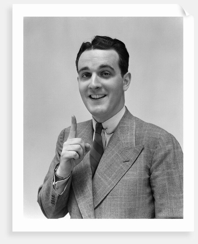 1940s Man In Suit Holding Up Index Finger Making A Point by Anonymous