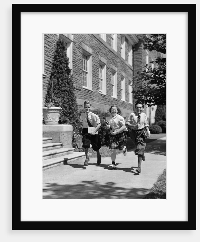 1940s Three School Children 2 Boys 1 Girl Running Down Sidewalk Carrying Books by Anonymous