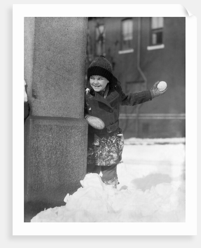 1930s Boy Peeking Around Side Building Throwing A Snowball Winter by Anonymous