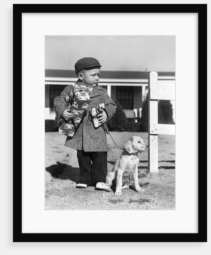 1940s Boy With Puppy On Leash Holding Christmas Present by Anonymous