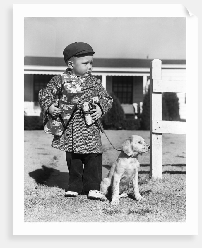 1940s Boy With Puppy On Leash Holding Christmas Present by Anonymous