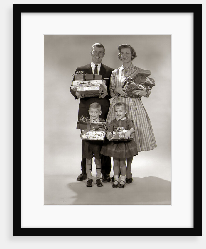 1950s 1950s Family Carrying Christmas Gifts Wrapped Presents by Anonymous