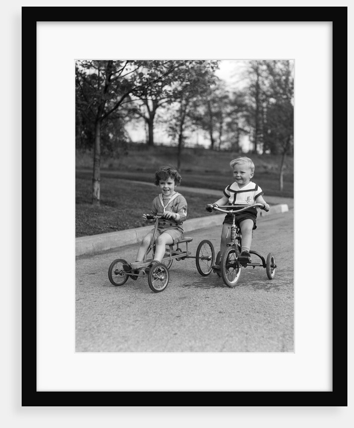 1930s Two Boys Riding Tricycles by Anonymous