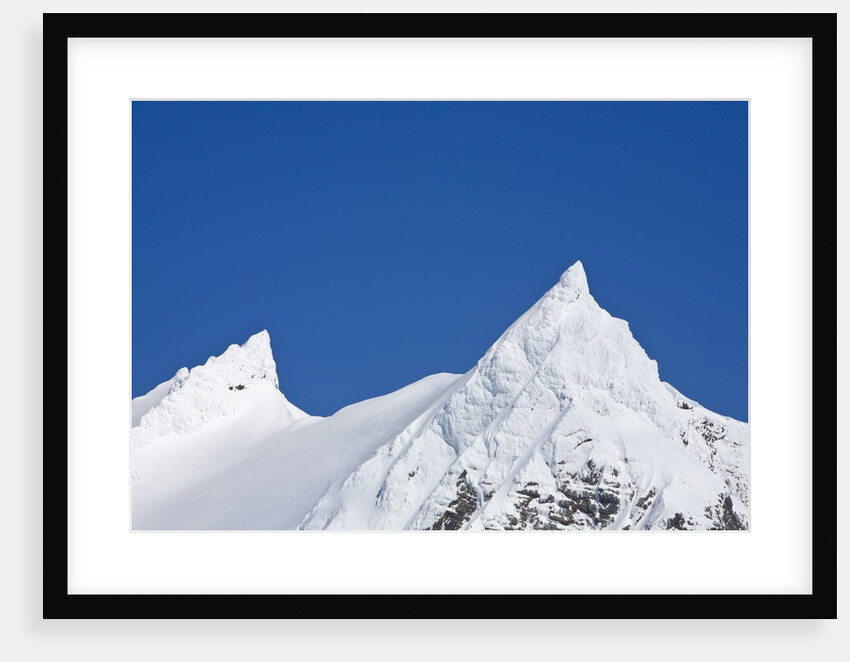 Snowy Peaks in Blue Sky by Anonymous