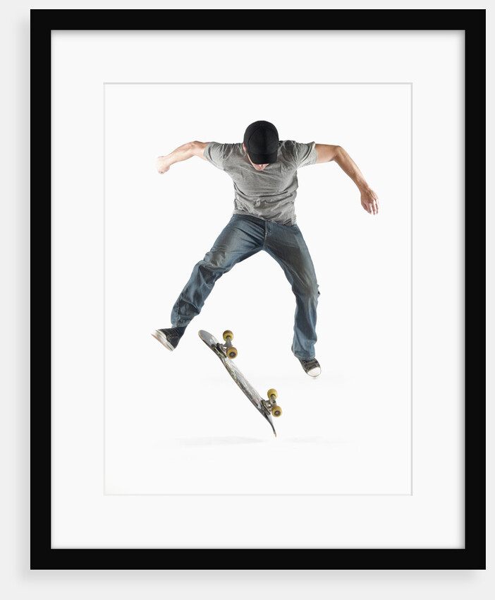 Young Skateboarder Doing Trick by Anonymous