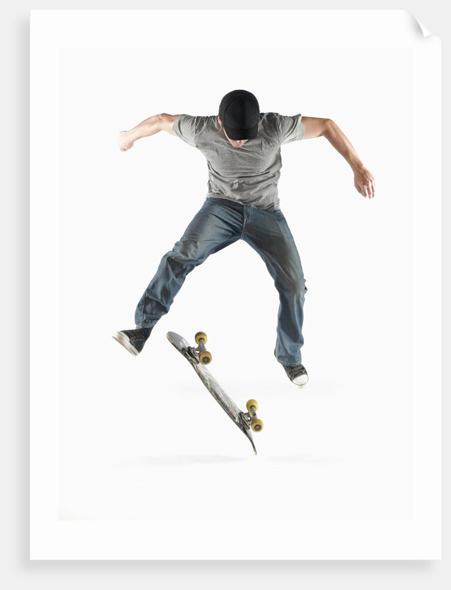 Young Skateboarder Doing Trick by Anonymous