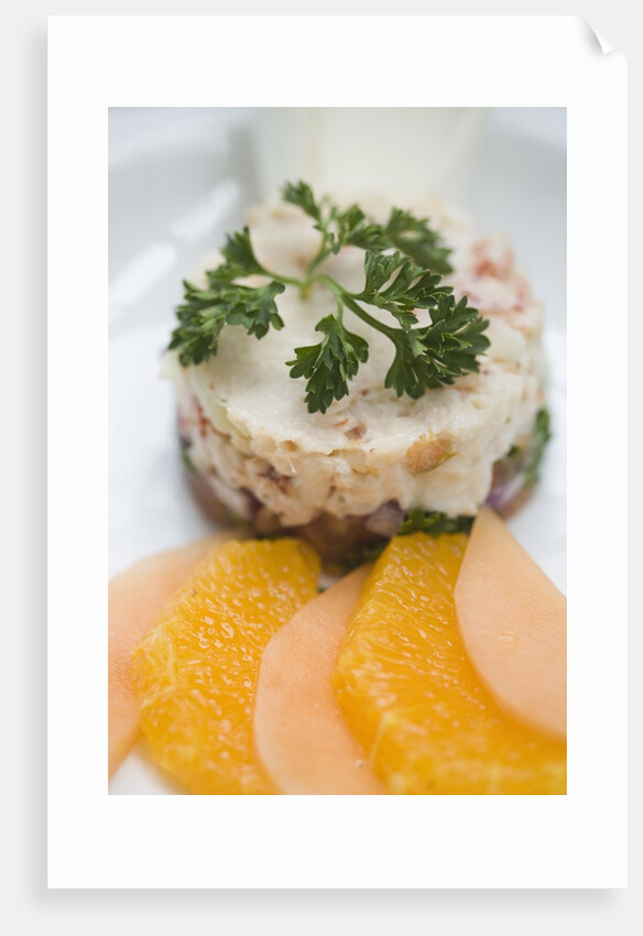 Crab and tropical fruit timbale with endive, melon and orange at The Sugar Mill, Tortola, British Virgin Islands by Anonymous