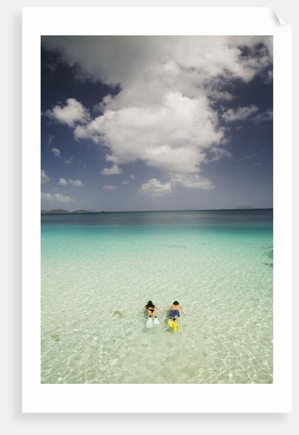 Couple Snorkeling in Cinnamon Bay at St. John Island by Anonymous