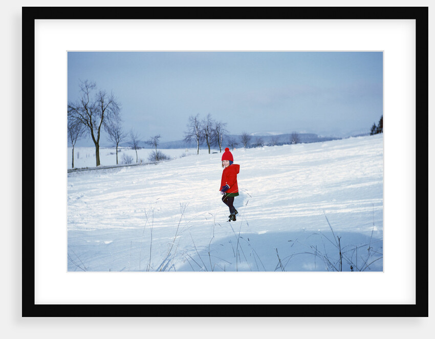 Germany - Bielefeld - 1960's child plays in snow by Anonymous