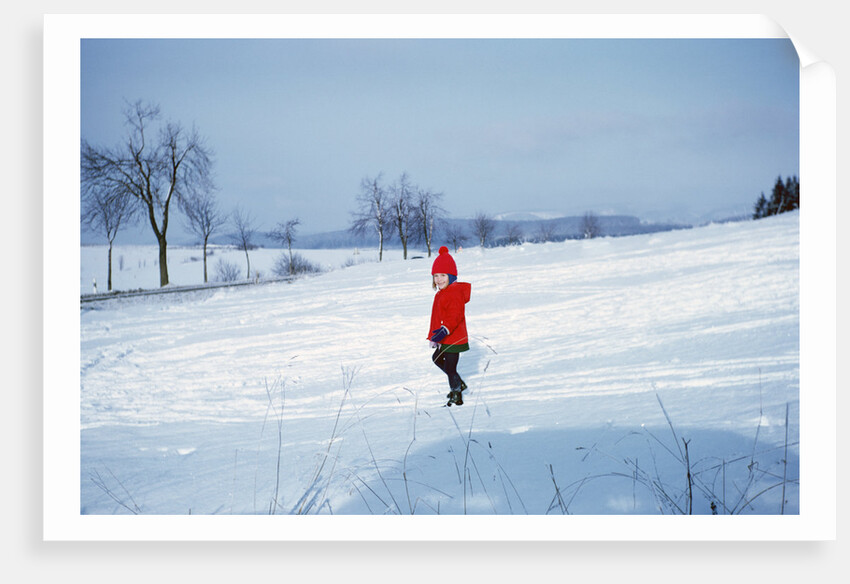 Germany - Bielefeld - 1960's child plays in snow by Anonymous