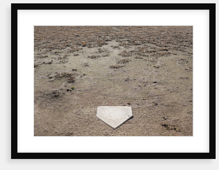 Home Plate on Field of Dirt and Dead Grass by Anonymous