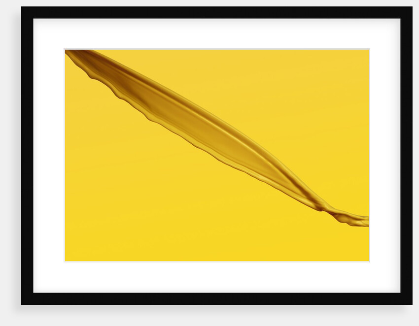 Pouring yellow liquid on yellow background by Anonymous