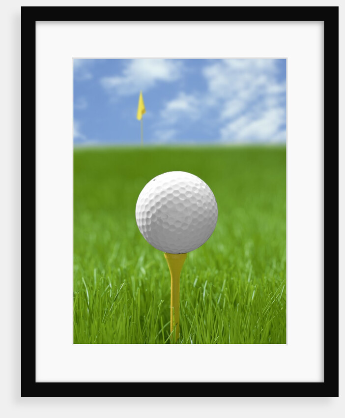 Golf ball on tee by Anonymous