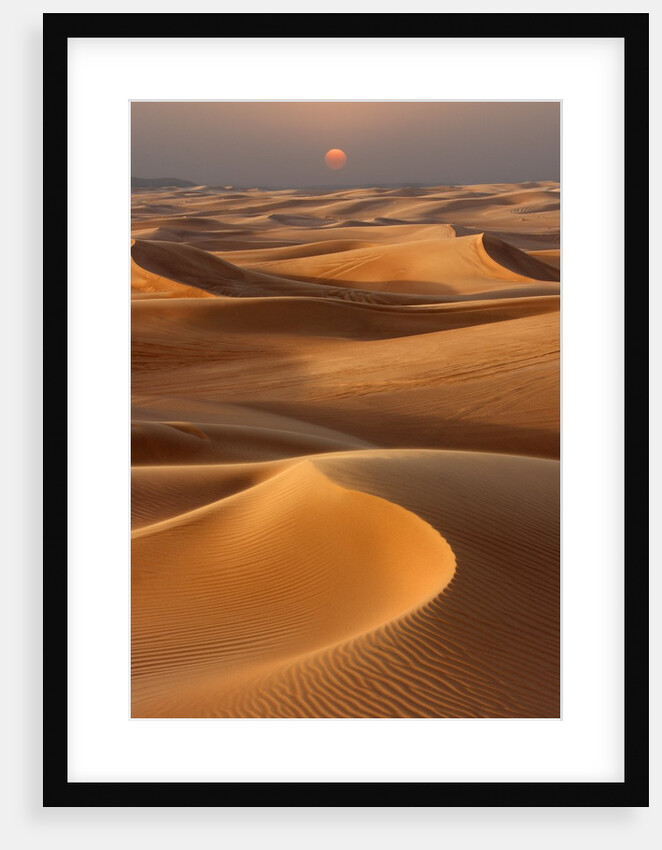 Sunset over the sand dunes in Dubai by Anonymous