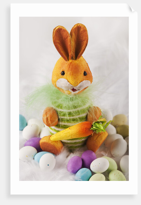 Toy bunny with candy eggs by Anonymous