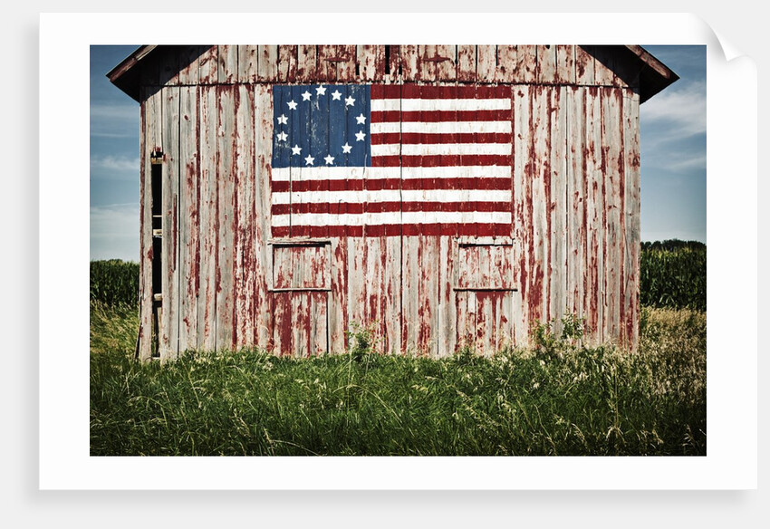 American flag painted on barn by Anonymous