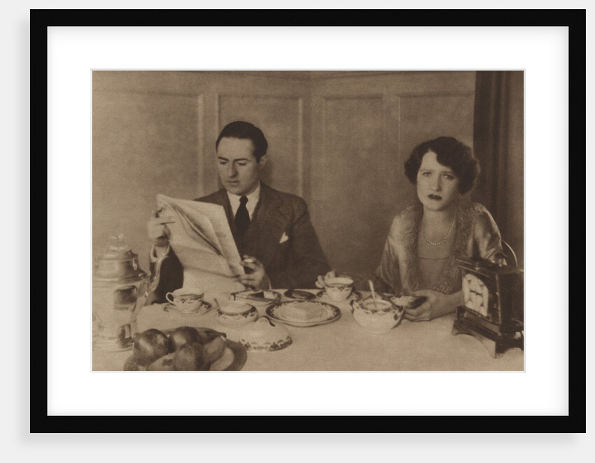 Husband and wife at breakfast by Anonymous