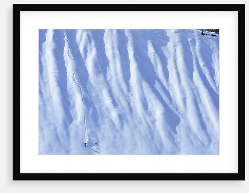 Man Snowboarding in the Backcountry of Roger's Pass, British Columbia, Canada. by Anonymous