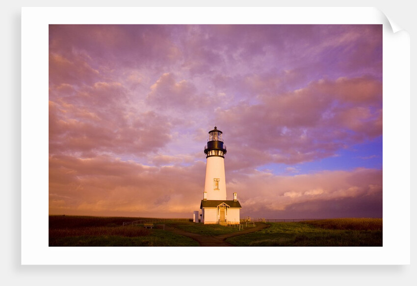 Yaquina Head lighthouse at sunrise by Anonymous