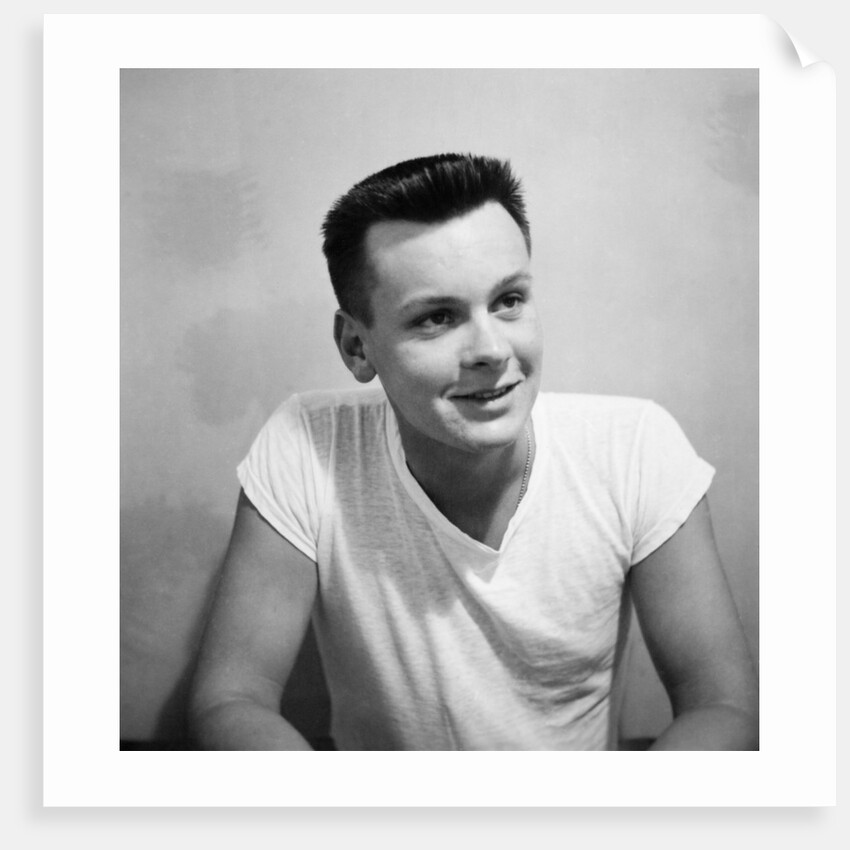 A skinny 21 year old boy in a portrait, ca. 1951 by Anonymous