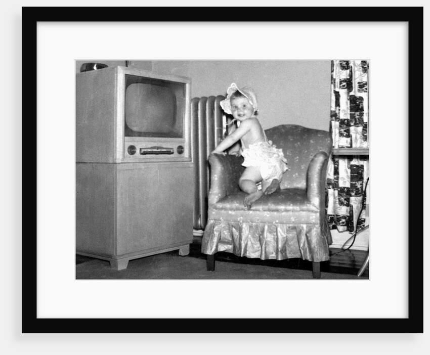 Baby girl wants to watch television, ca. 1954 by Anonymous