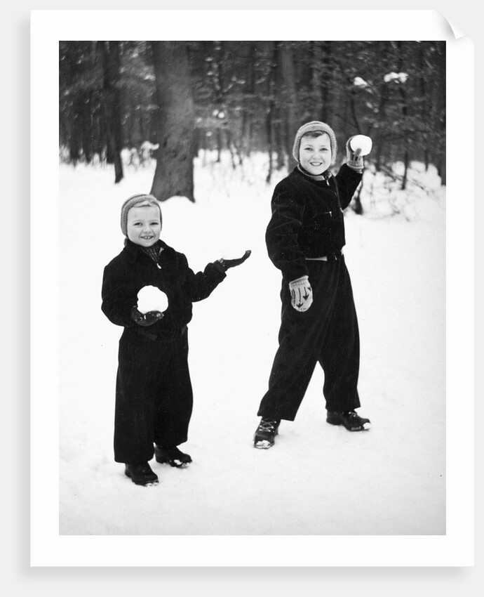 Two brothers play in the snow, ca. 1950 by Anonymous