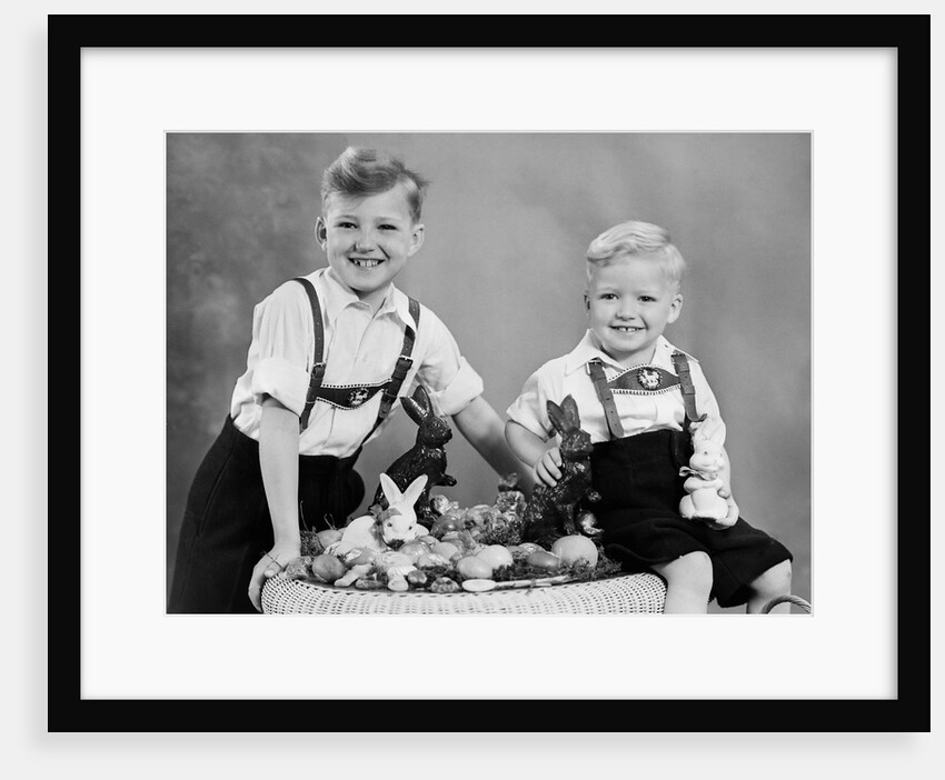 Two brothers sit with Easter decorations, ca. 1948 by Anonymous