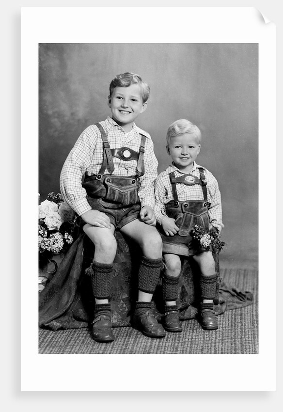 Two brothers pose for a childhood portrait in Germany, ca. 1949 by Anonymous