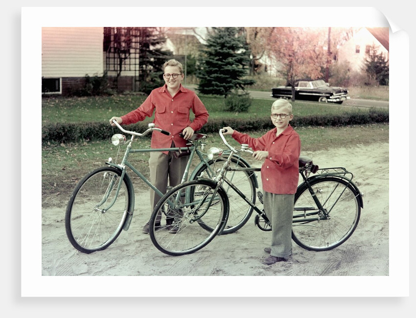 Two brothers stand with their new bikes in Wisconsin, ca. 1953 by Anonymous