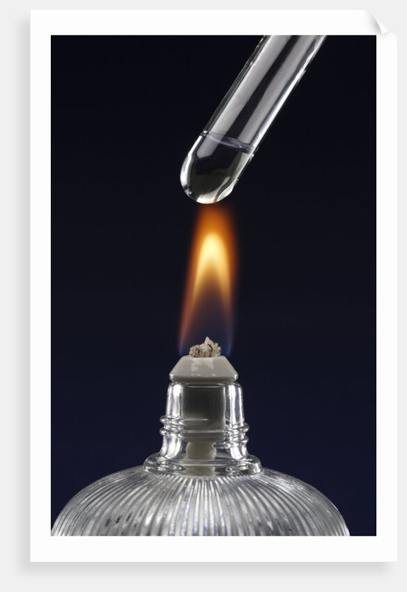 Test tube with liquid, over flame by Anonymous