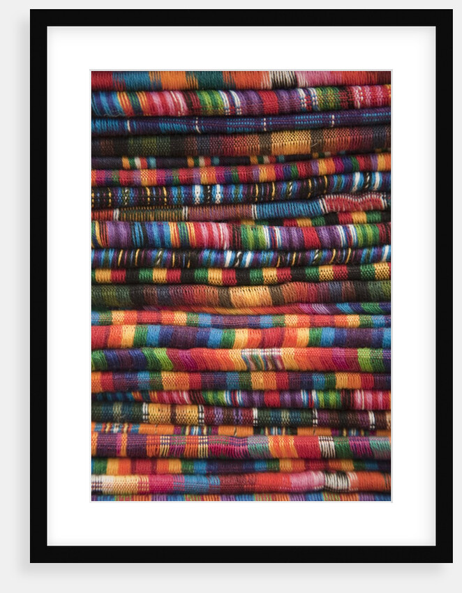 Textiles for sale in market in San Miguel de Allende by Anonymous