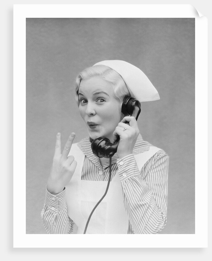 Smiling blond nurse with surprised expression talking on telephone holding up two fingers by Anonymous