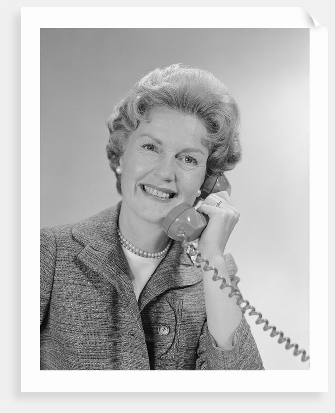 Portrait smiling mature woman talking on telephone by Anonymous
