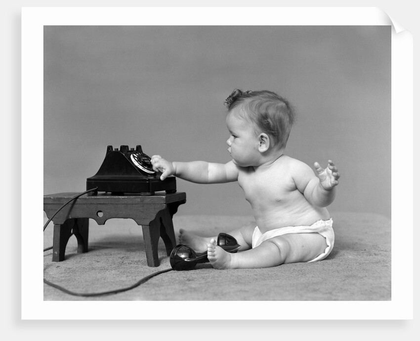 Baby in diaper dialing telephone by Anonymous