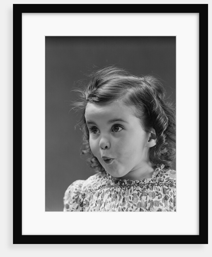 Portrait brunette little girl with surprised amazed facial expression by Anonymous