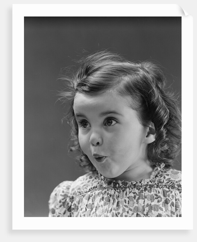 Portrait brunette little girl with surprised amazed facial expression by Anonymous