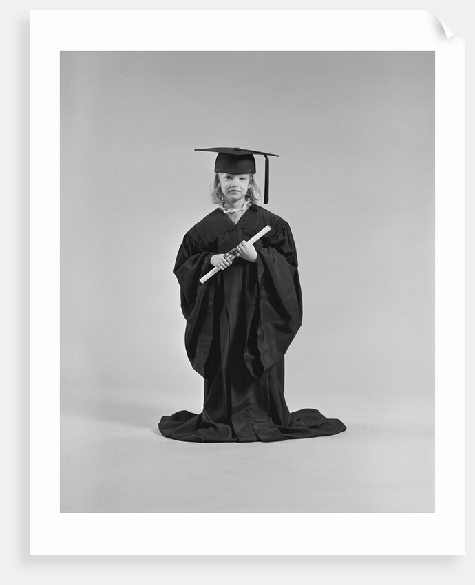 Girl wearing graduation cap gown holding diploma by Anonymous
