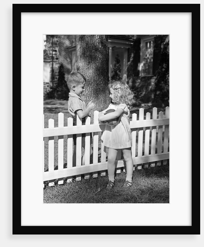 Boy girl holding ball talking flirting over white picket fence neighbors by Anonymous