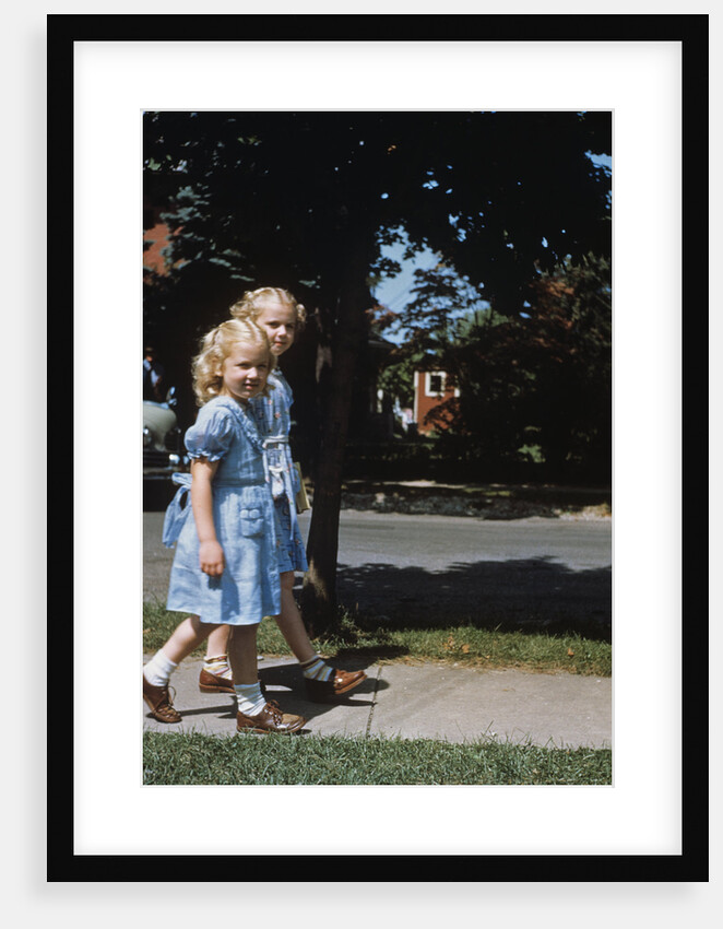 Two blond girls wearing blue dresses on the first day of school by Anonymous