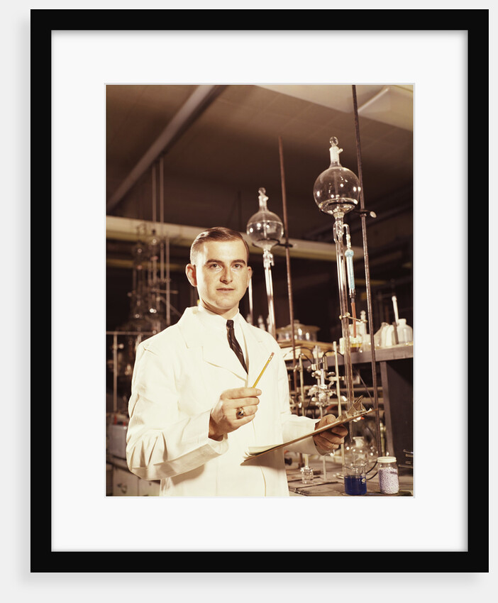 Scientist conducting a titration experiment by Anonymous