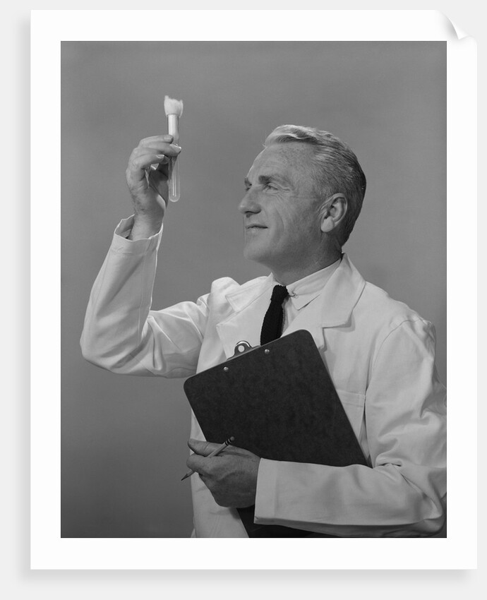 Man scientist studying test tube by Anonymous