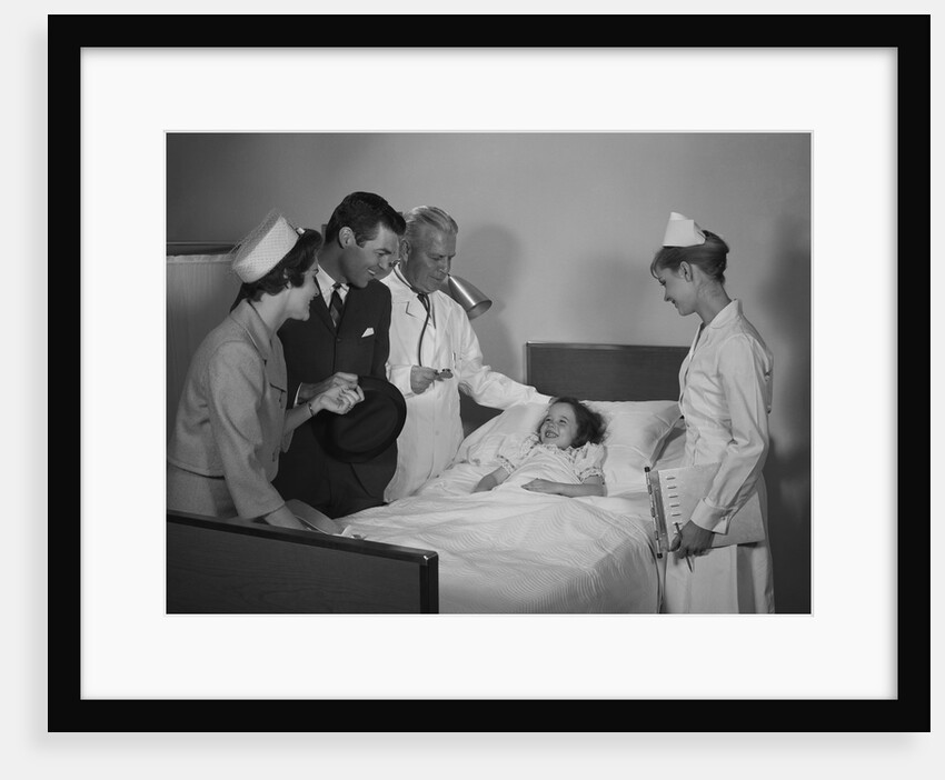 Man doctor woman nurse mother father seeing visiting smiling little girl patient in hospital bed by Anonymous