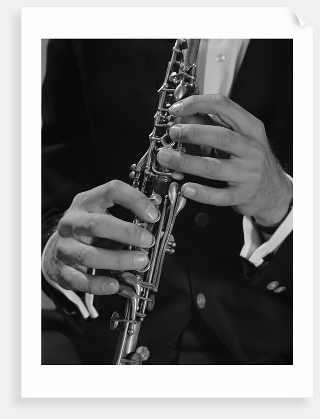 Male hands playing clarinet by Anonymous