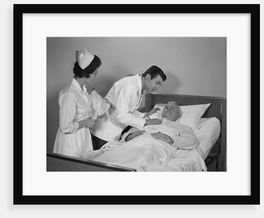 Doctor and nurse checking on elderly male patient in hospital bed by Anonymous