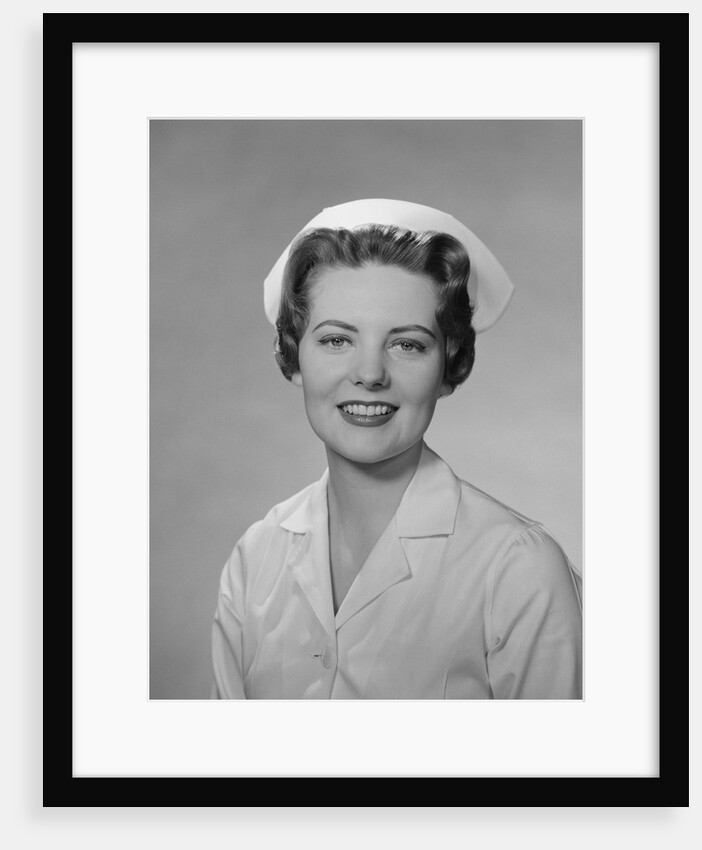 Portrait female nurse smiling by Anonymous