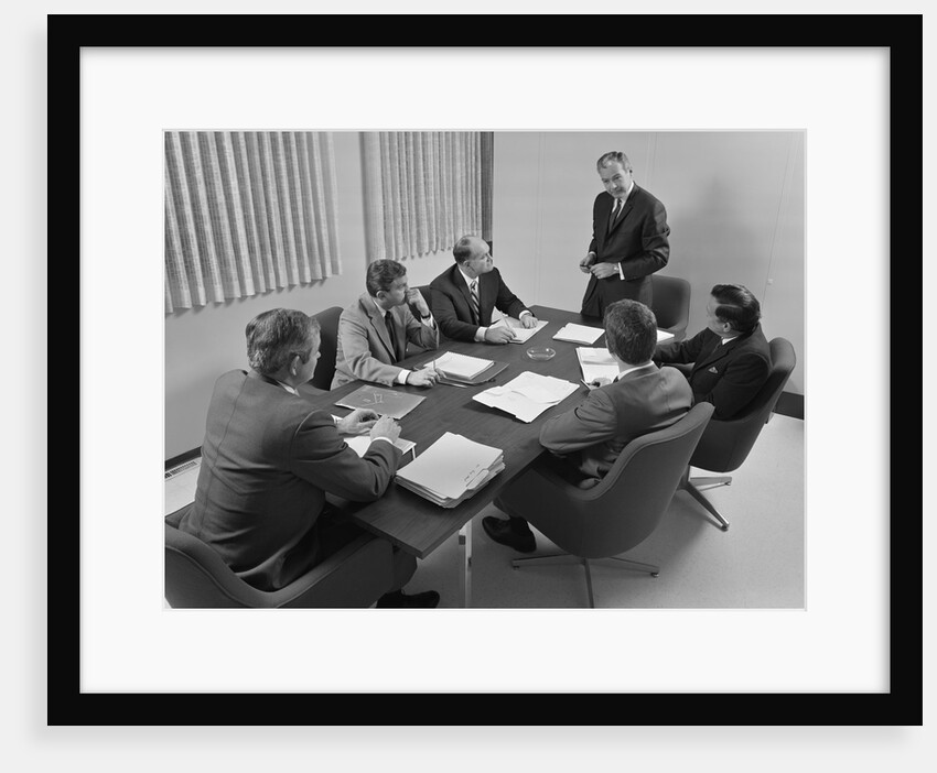 6 executive businessmen around conference table board meeting by Anonymous
