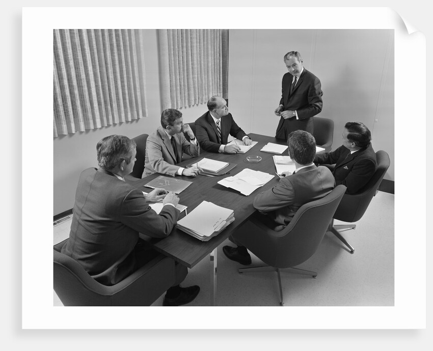 6 executive businessmen around conference table board meeting by Anonymous