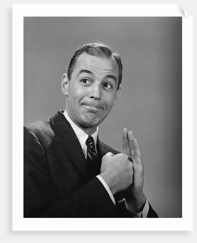 Man punching his fist into his palm with satisfied expression by Anonymous