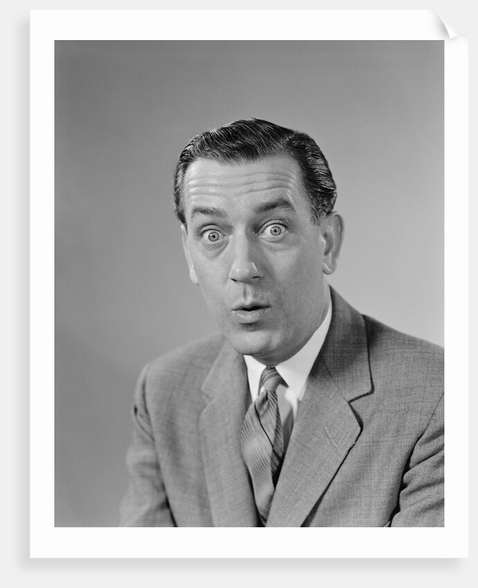 Businessman bulging eyes wide open shocked facial expression by Anonymous