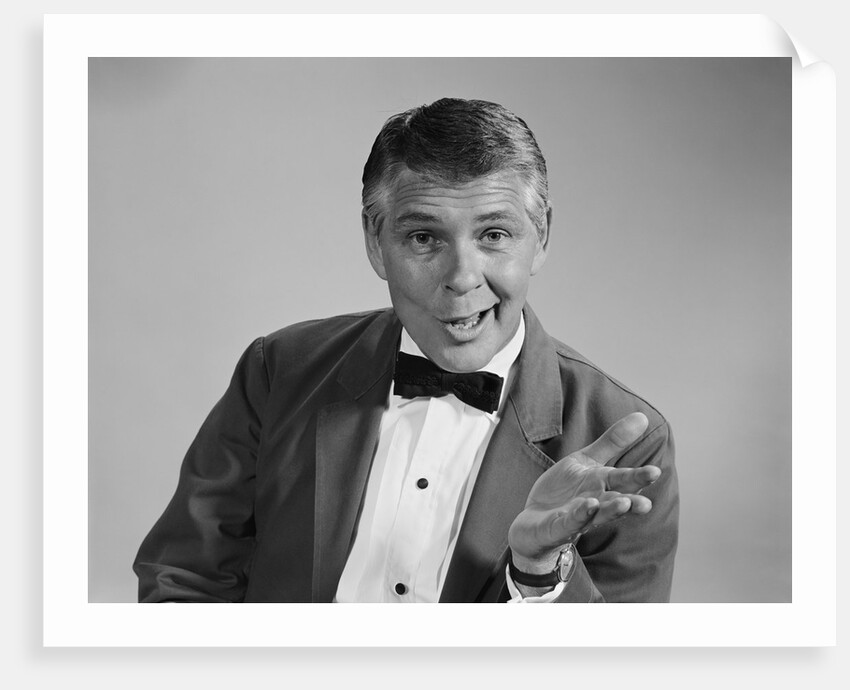 Portrait man wearing bow tie quizzical facial expression & gesture by Anonymous